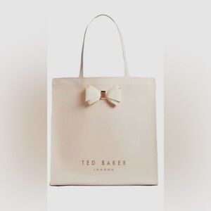 Ted Baker Icon Tote
Elegant Cream PVC Tote with Bow 
NEW WITH TAGS